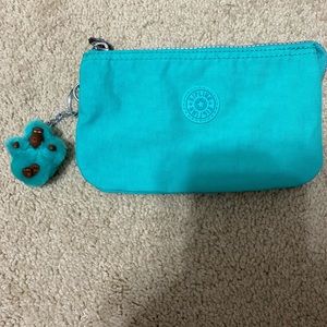 Turquoise wallet/travel bag